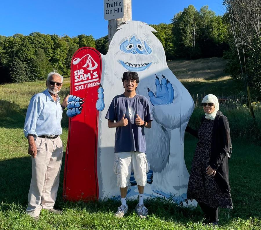 Happy senior couple with their LinkedHearts companion